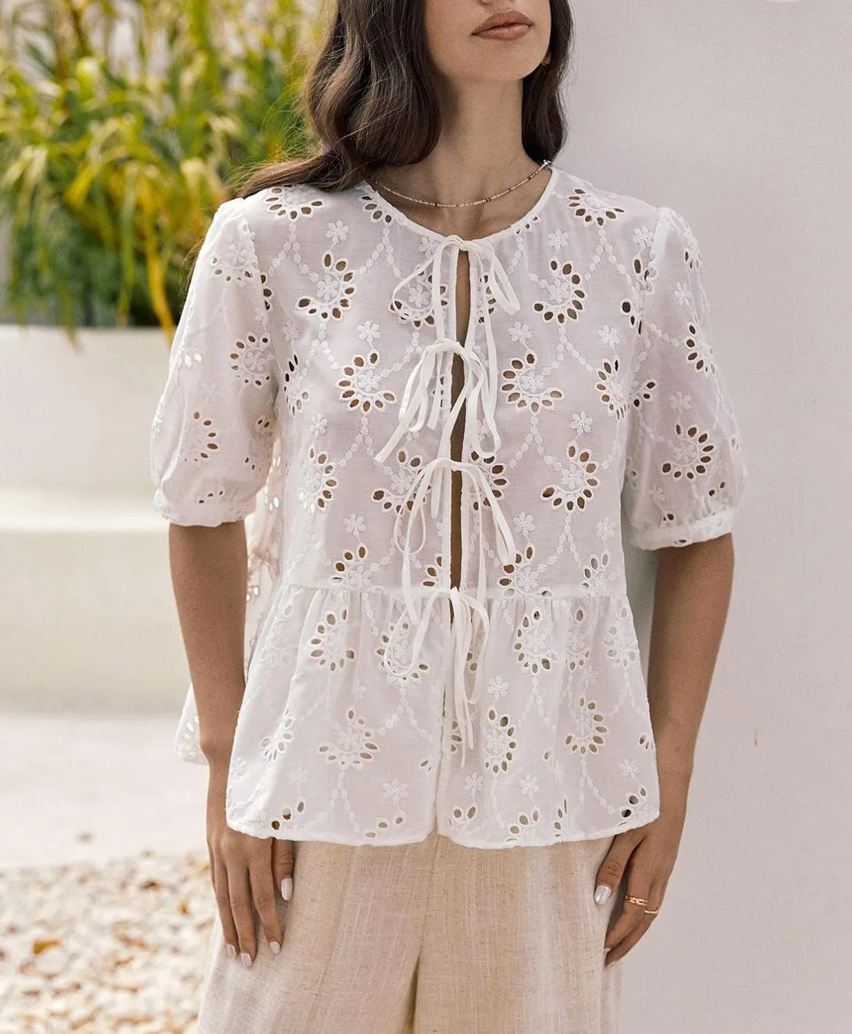 WDIRARA Women's Floral Print Bow Tie Front Blouse Puff Short Sleeve Round Neck Peplum Babydoll Shirt